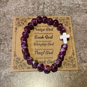 Purple Beaded Bracelet with White Cross